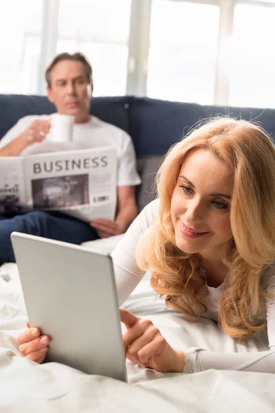 Woman using digital tablet — Stock Photo