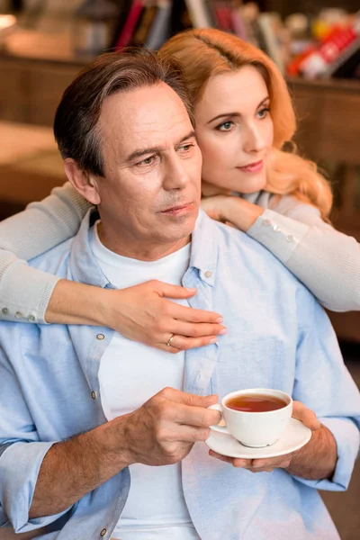 Mature couple with tea — Stock Photo