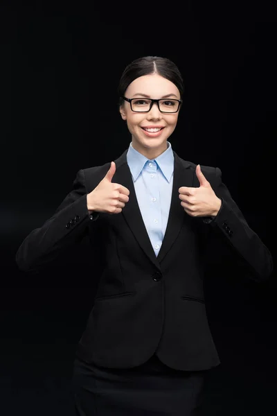 Businesswoman showing thumbs up — Stock Photo