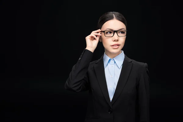 Businesswoman in black suit — Stock Photo