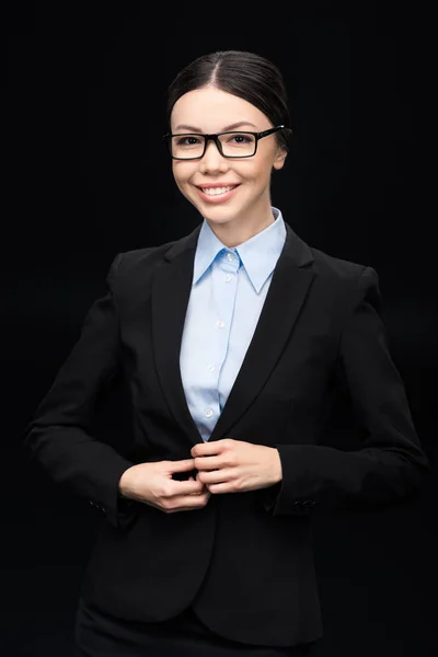 Mujer de negocios en traje negro - foto de stock