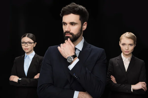 Pensive business people — Stock Photo