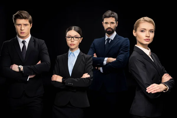 Businesspeople with crossed arms — Stock Photo