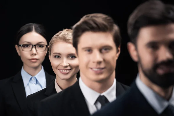 Business people standing in row — Stock Photo