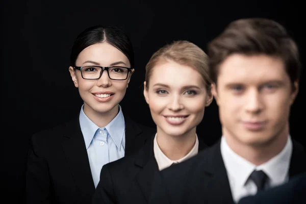 Business people standing in row — Stock Photo