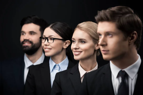 Business people standing in row — Stock Photo