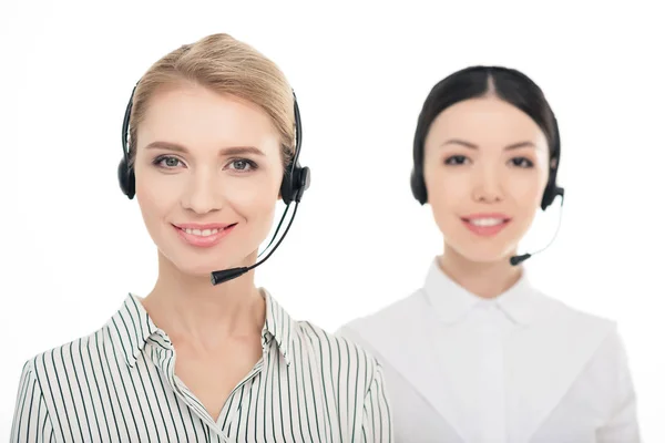 Operadores de centros de llamadas en auriculares - foto de stock