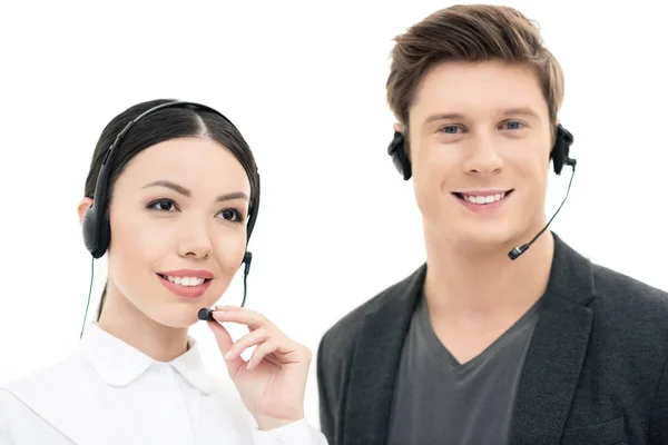 Call center operators in headsets — Stock Photo