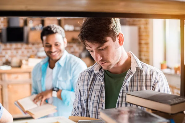 Men working with books — Stock Photo