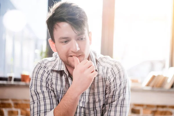 Young thoughtful man — Stock Photo