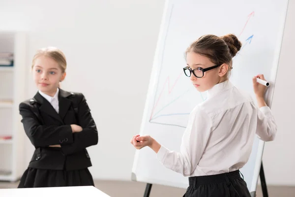 Two little girls in formal clothes — Stock Photo