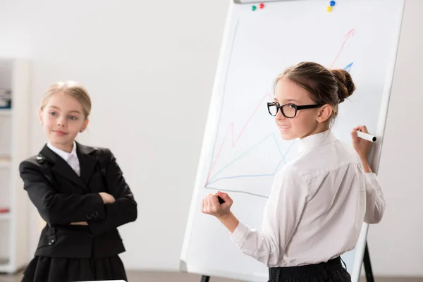 Two little girls in formal clothes — Stock Photo