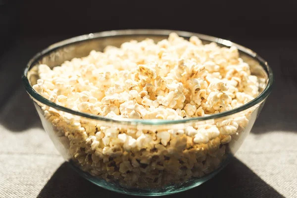 Popcorn in glass bowl — Stock Photo