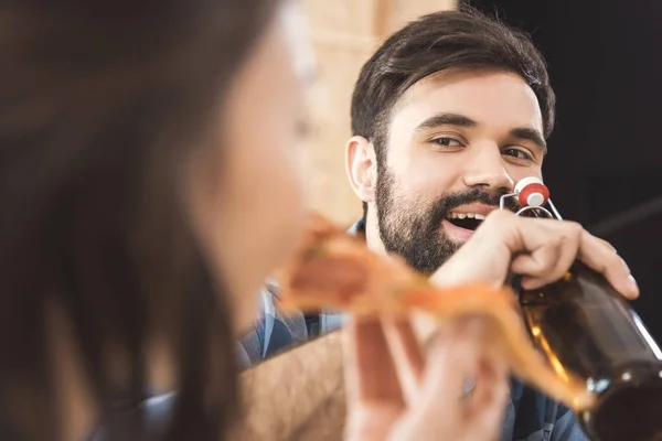 Young man drinking beer — Stock Photo