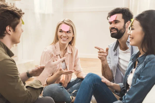 People playing game guess who — Stock Photo