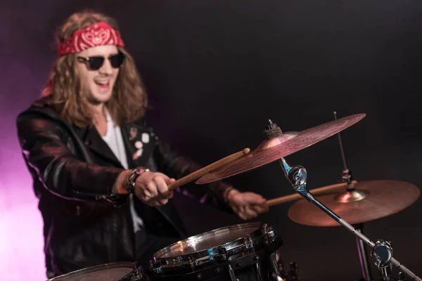 Young musician with drums set — Stock Photo