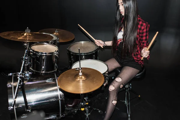 Young musician with drums set — Stock Photo