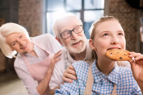 Girl with homemade cookie — Stock Photo