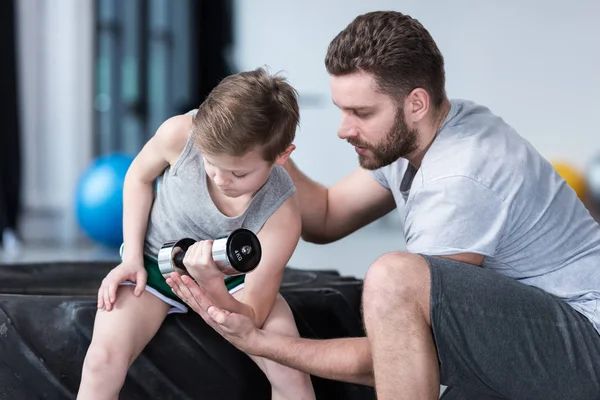 Boy training with coach — Stock Photo