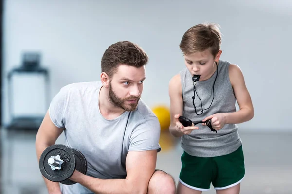 Boy coach training man — Stock Photo