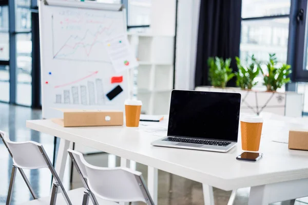 Laptop computer on workplace — Stock Photo