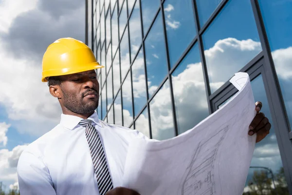 Professional architect in hard hat — Stock Photo