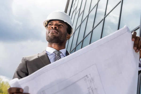 Professional architect in hard hat — Stock Photo