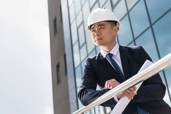 Professional architect in hard hat — Stock Photo