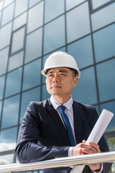 Professional architect in hard hat — Stock Photo