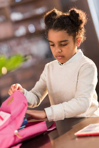 Schoolgirl preparing for school — Stock Photo