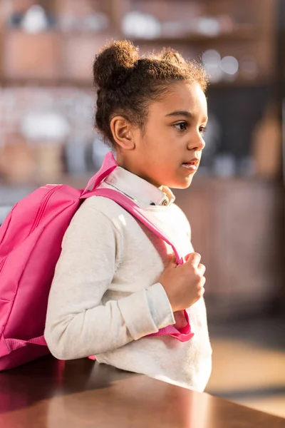 Schoolgirl preparing for school — Stock Photo