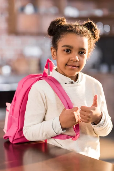 Schoolgirl preparing for school — Stock Photo