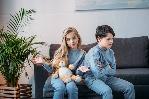 Adorable girl and offended boy — Stock Photo