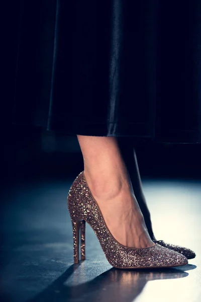 Woman in glitter high heels — Stock Photo