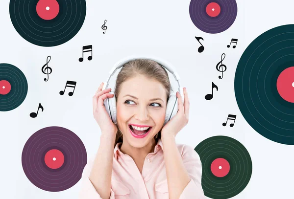 Woman listening music with headphones — Stock Photo