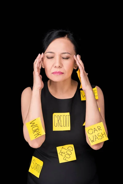 Femme d'affaires stressée avec des notes collantes — Photo de stock