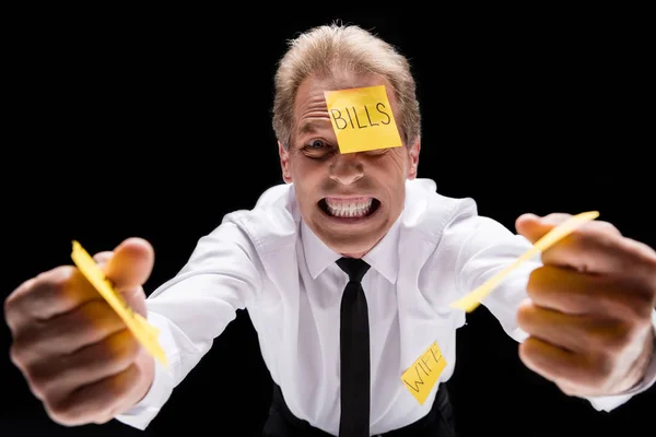 Stressed businessman with sticky notes — Stock Photo