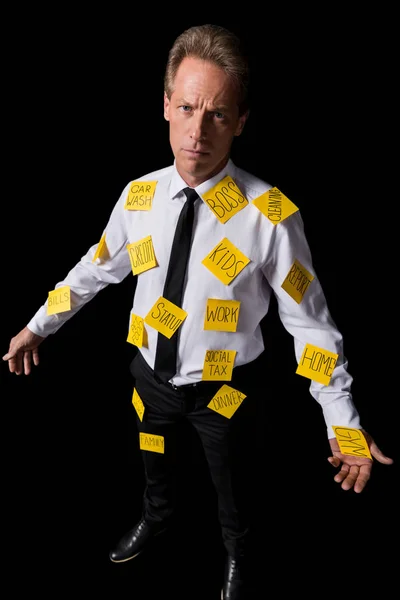 Stressed businessman with sticky notes — Stock Photo