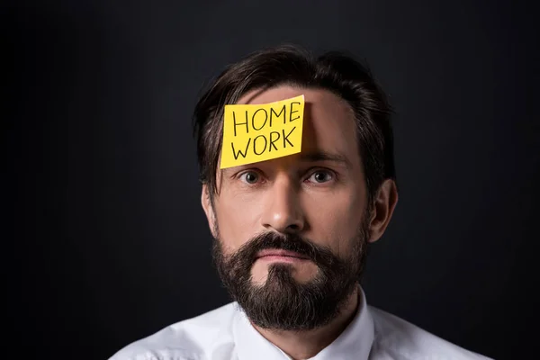 Businessman with sticky note on forehead — Stock Photo