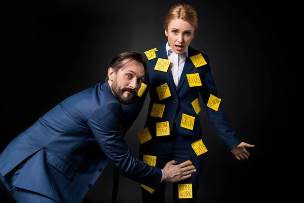 Stressed businesswoman with colleague — Stock Photo