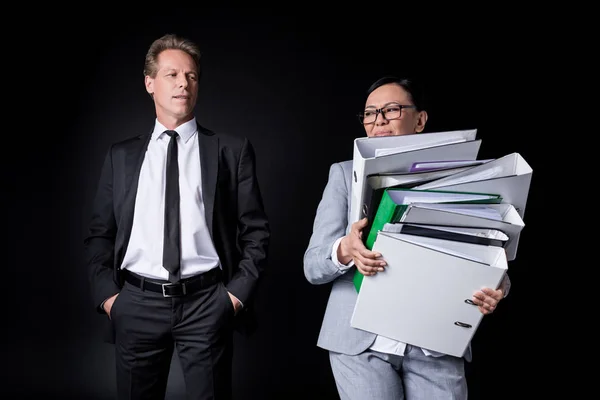 Business colleagues with folders — Stock Photo
