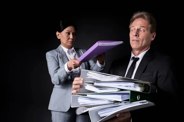Business colleagues with folders — Stock Photo