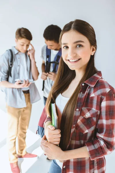 Multiethnic teenagers with backpacks — Stock Photo
