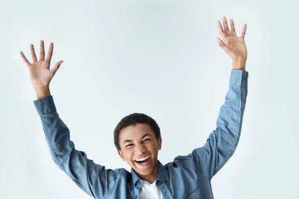 African american teenager with outstretched arms — Stock Photo