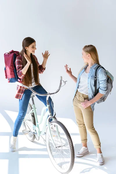 Teenage girls looking at each other — Stock Photo