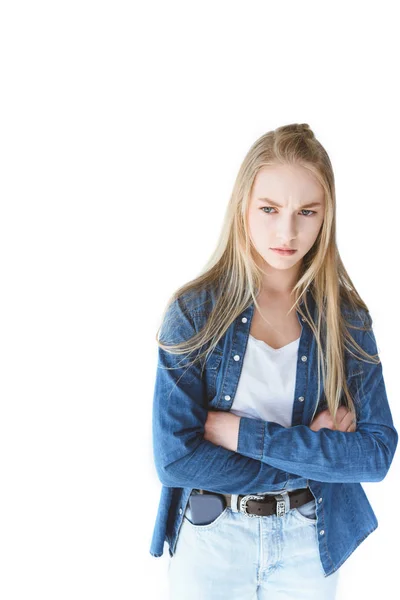 Grumpy teenage girl with arms crossed — Stock Photo