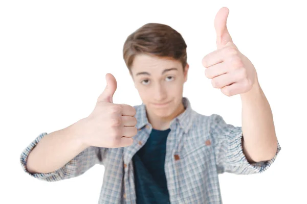 Caucasian teenager showing thumbs up — Stock Photo