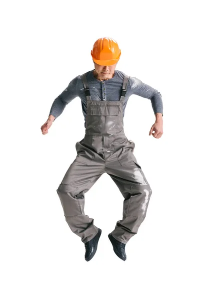 Trabajador de la construcción en general saltando - foto de stock