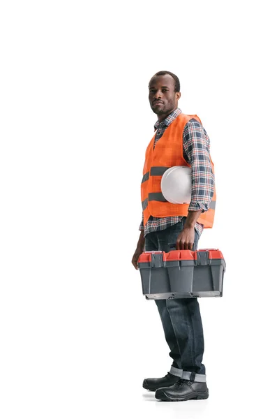 Trabajador de la construcción con caja de herramientas - foto de stock