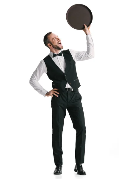 Happy waiter in suit with tray — Stock Photo